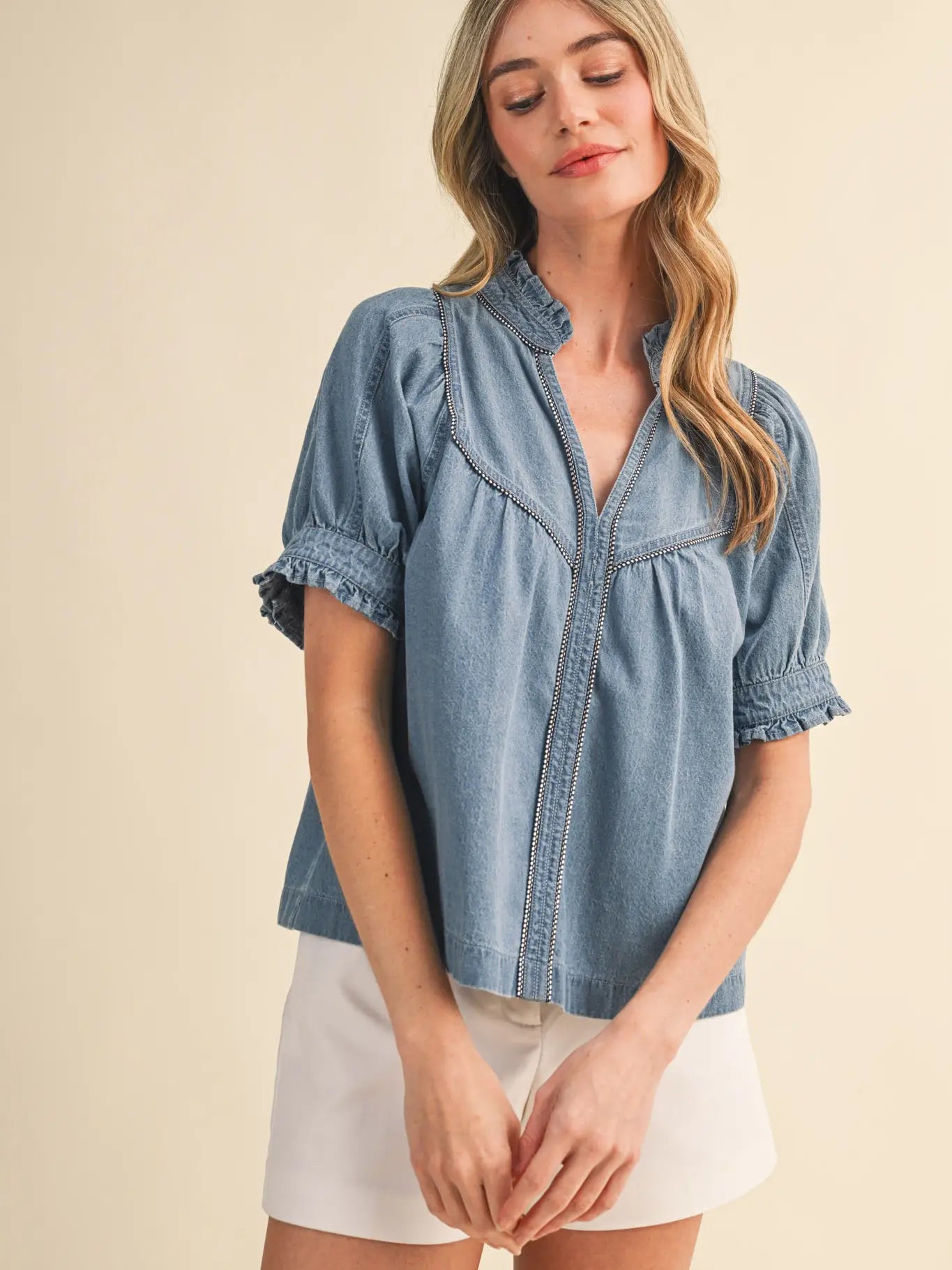 Denim chambray ruffled top with piping trim