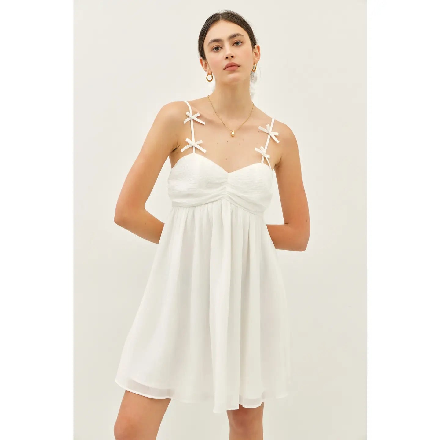 Off White Textured Babydoll Mini Dress with Bow Detail
