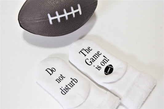 Do Not Disturb The Game is on Football Baby Socks