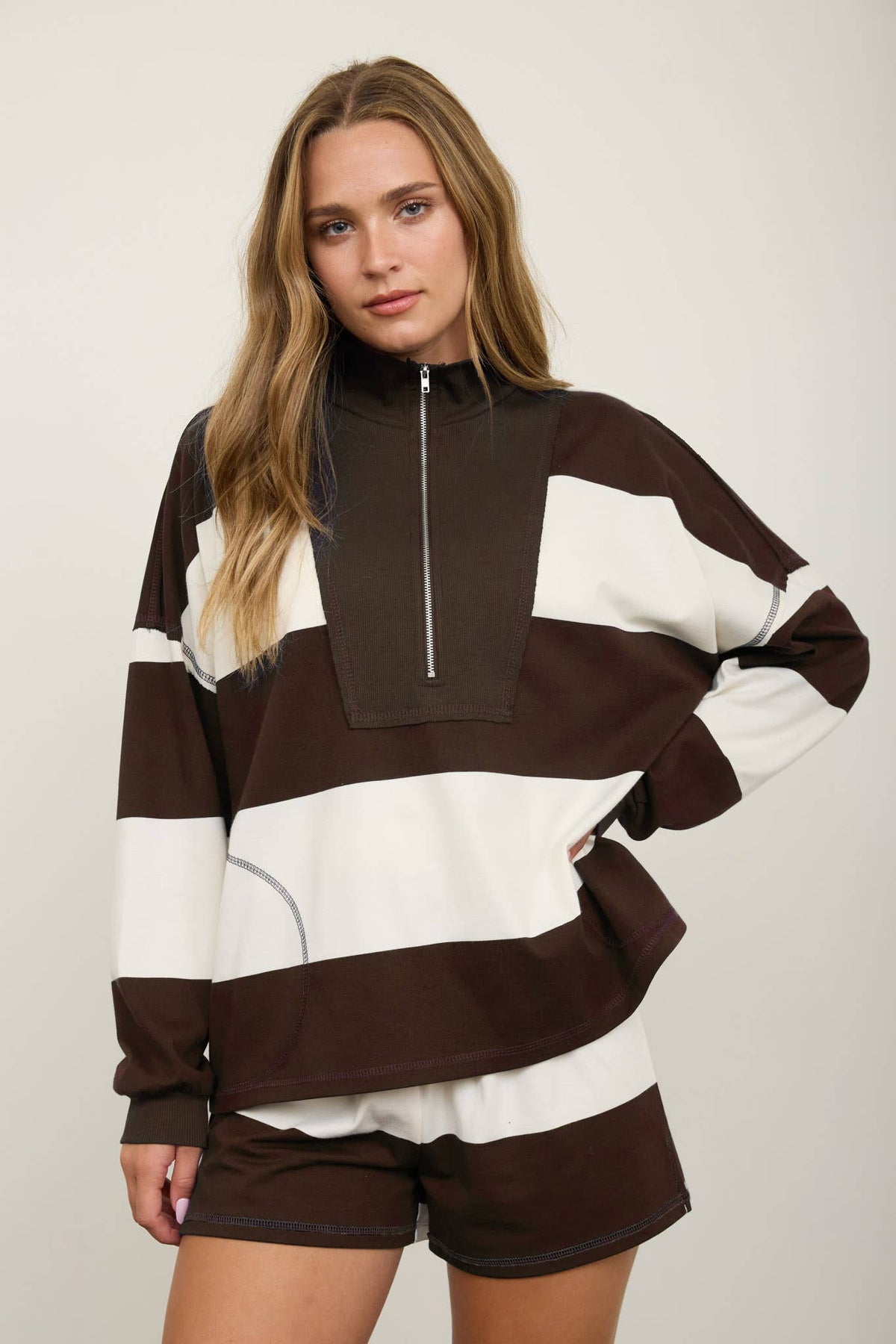 Brown Wide Stripe Half Zip Long Sleeve Top.